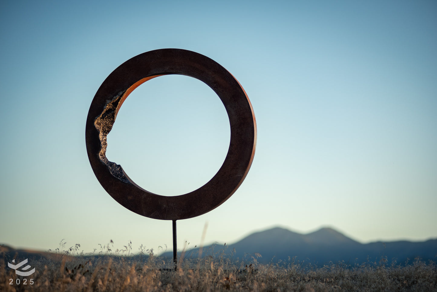 Eroded Zero - Abstract geometric metal sculpture