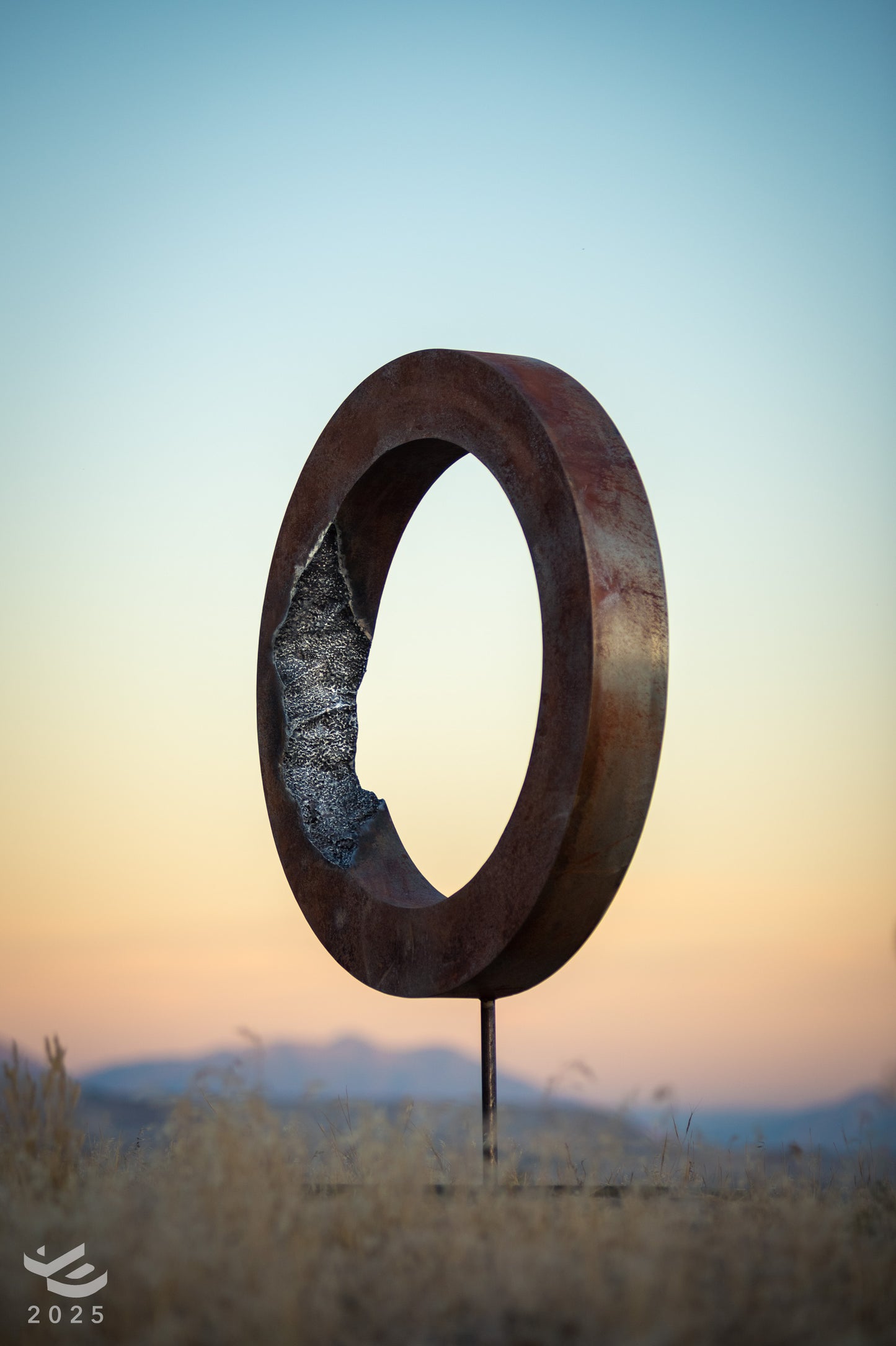 Eroded Zero - Abstract geometric metal sculpture