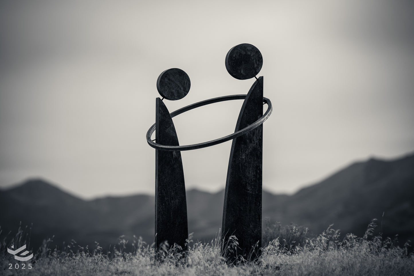 Together - Sharing a bond. Abstract geometric metal sculpture.