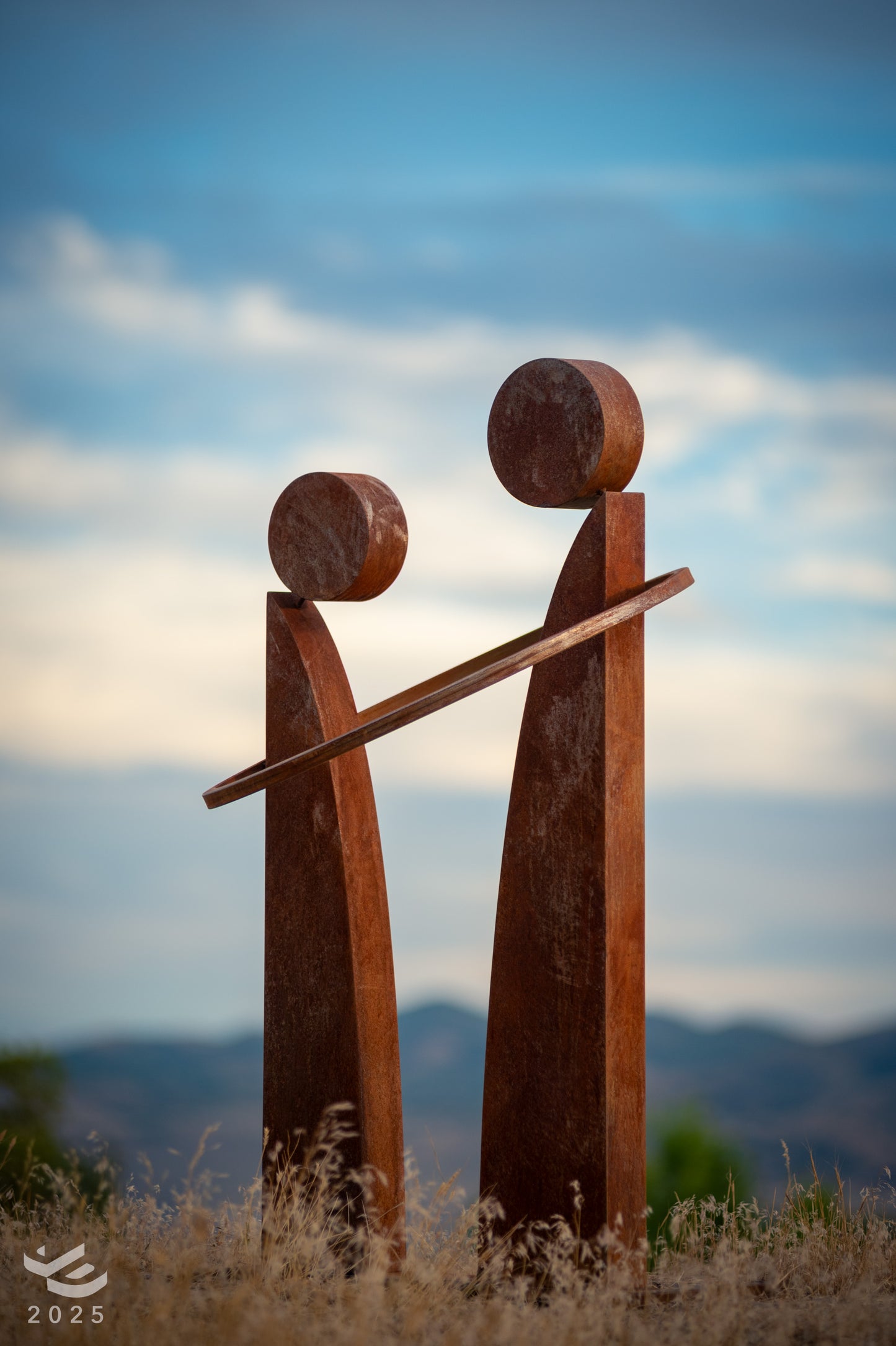 Together - Sharing a bond. Abstract geometric metal sculpture.