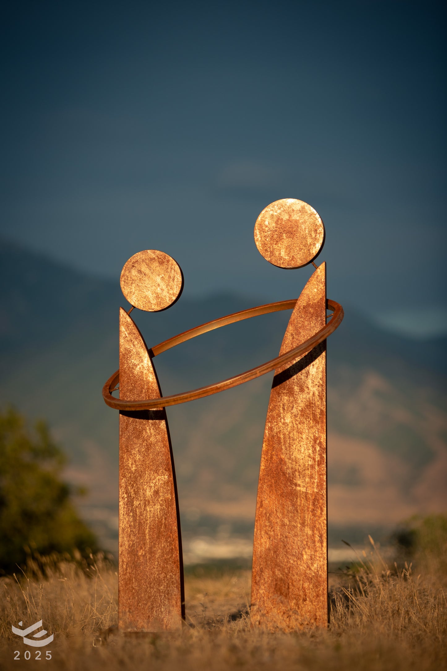 Together - Sharing a bond. Abstract geometric metal sculpture.