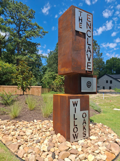 Balanced - Abstract geometric steel sculpture used as a signage