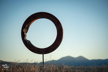 Eroded Zero - Abstract geometric metal sculpture