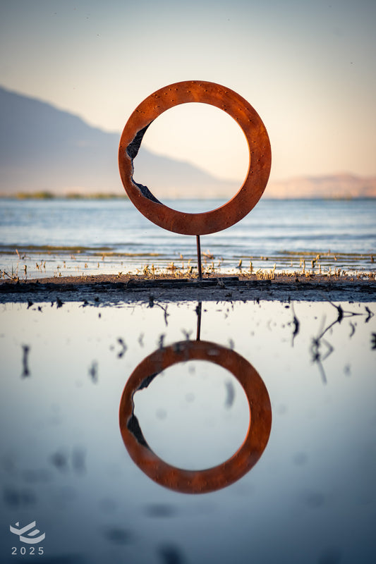Eroded Zero - Abstract geometric metal sculpture