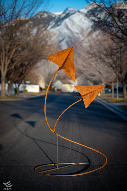 Origami airplanes taking flight - Geometric metal sculpture