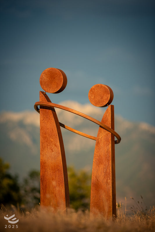Together - Sharing a bond. Abstract geometric metal sculpture.