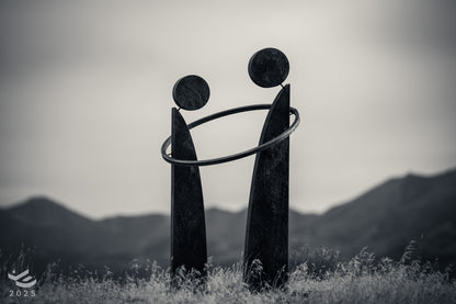 Together - Sharing a bond. Abstract geometric metal sculpture.